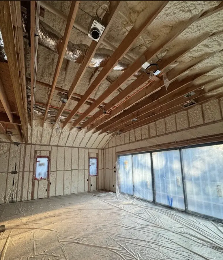 Interior walls and ceiling insulated with spray foam during new construction in Myrtle Grove